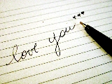 love you scritto su quaderno